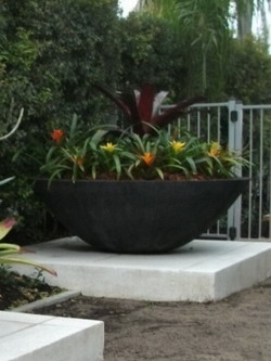 Potanico - creators of large garden bowls and water bowls. Big garden landscaping bowls designed for large plants, water features and fire pits.