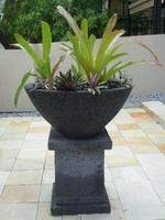 Large lava stone finish bowl and plinth, charcoal volcanic scoria finish
