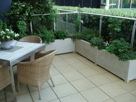 custom made to measure balcony planter boxes, white volcanic scoria finish