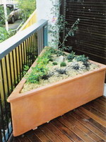 custom made triangle corner planter troughs and pot, aged terracotta semi formal finish