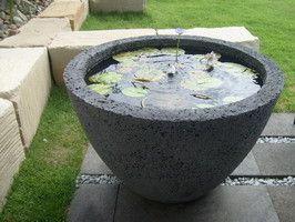 large volcanic scoria water feature pot, charcoal finish
