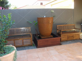large custom water feature pot, semi formal finish, custom made above ground kwila pond surround