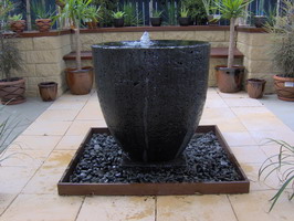 big water feature pot, black lava stone finish
