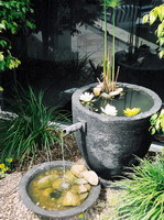 large water feature pot with japanese style spout and bowl, charcoal lava stone finish